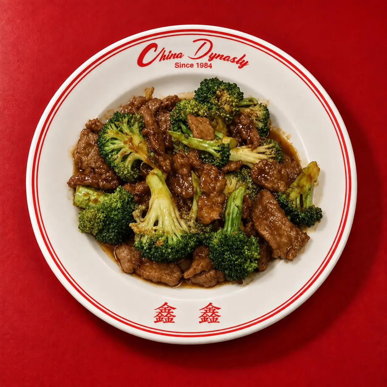 Beef and broccoli, tender sliced beef with fresh broccoli in rich brown sauce, a top Chinese takeout order in Austin