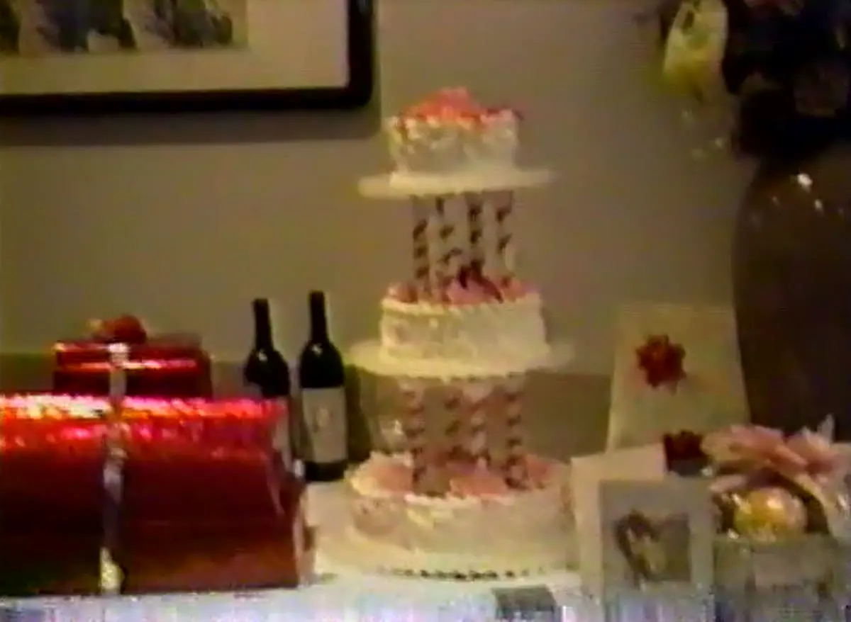 Judy and Jim’s three-tier engagement cake and red gift boxes, 1989