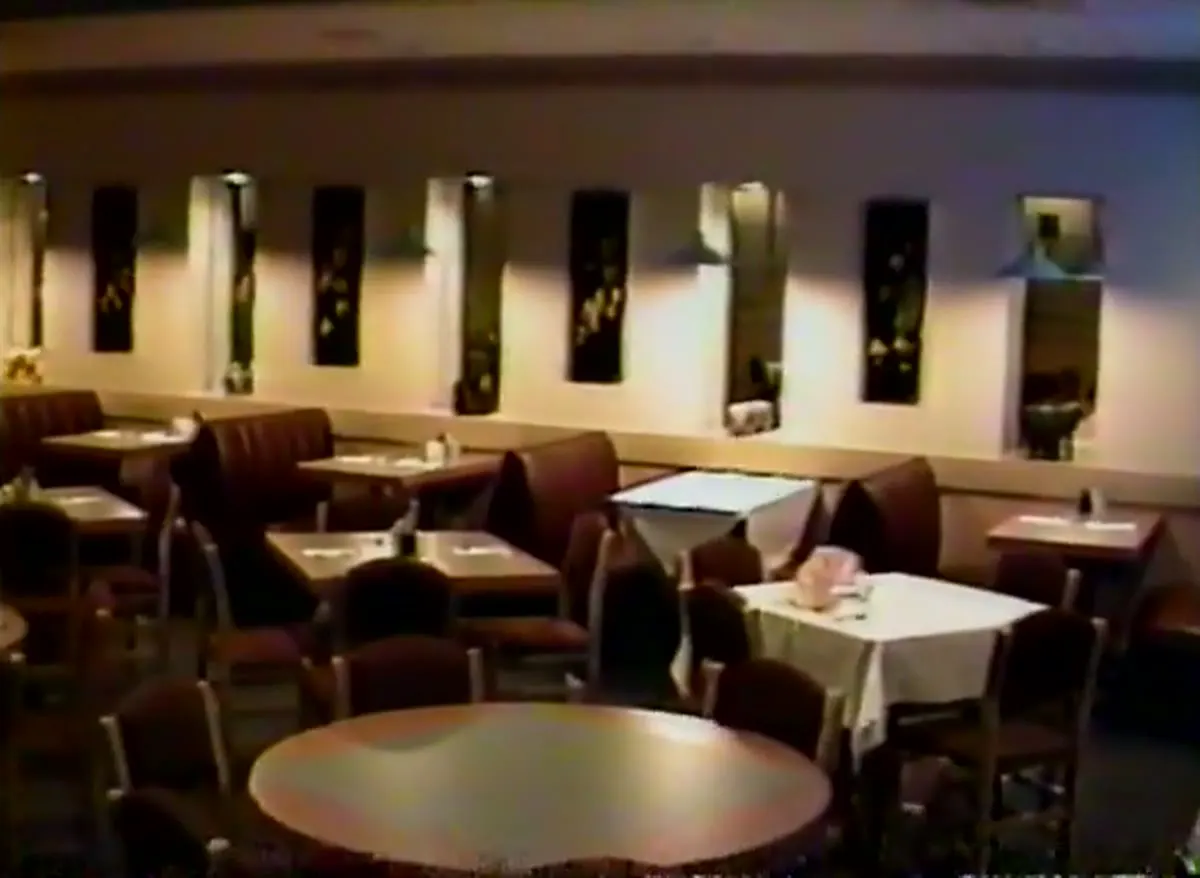 The Slaughter Lane dining room with black lacquer wall panels, 1989